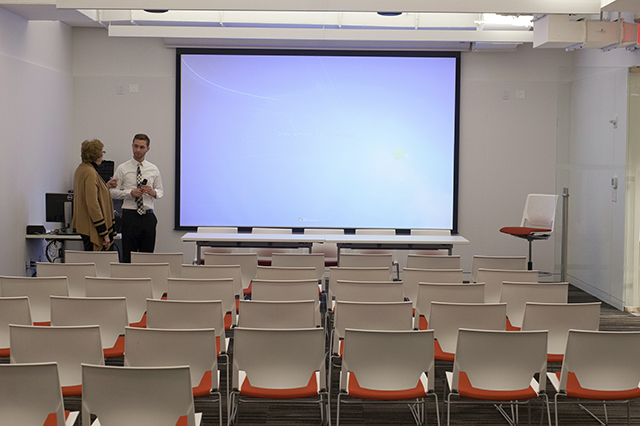 View of a presentation room with a large screen